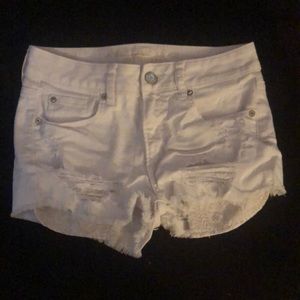stretchy white high-waisted jean shorts